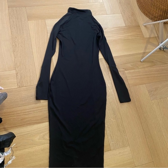 Black Contemporary Turtleneck Dress - Picture 3 of 4